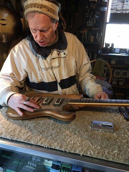 Old Man Holding The Vintage Guitar - Ottsville, PA - Tinicum Guitar Barn