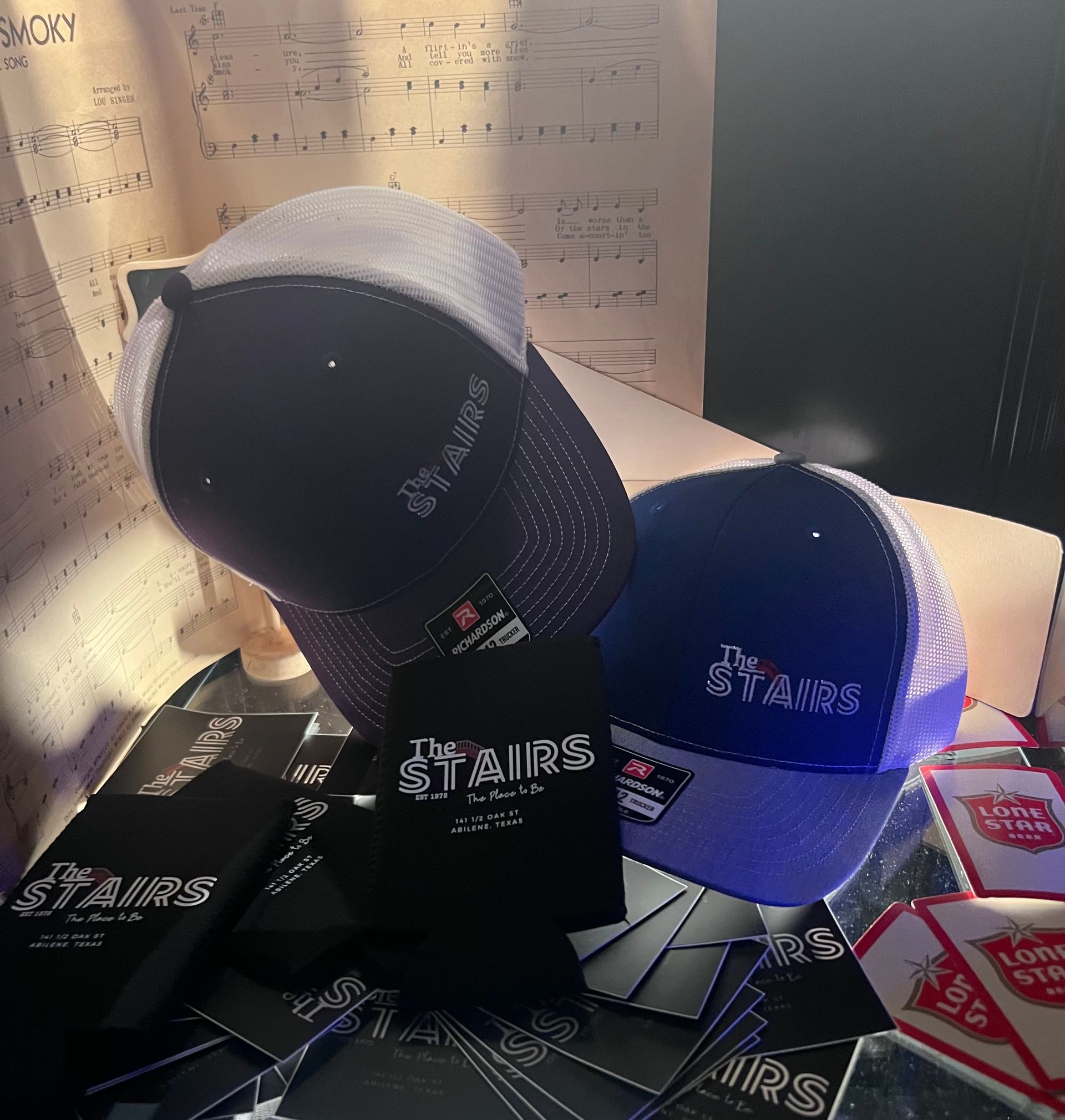 A hat with the word stairs on it