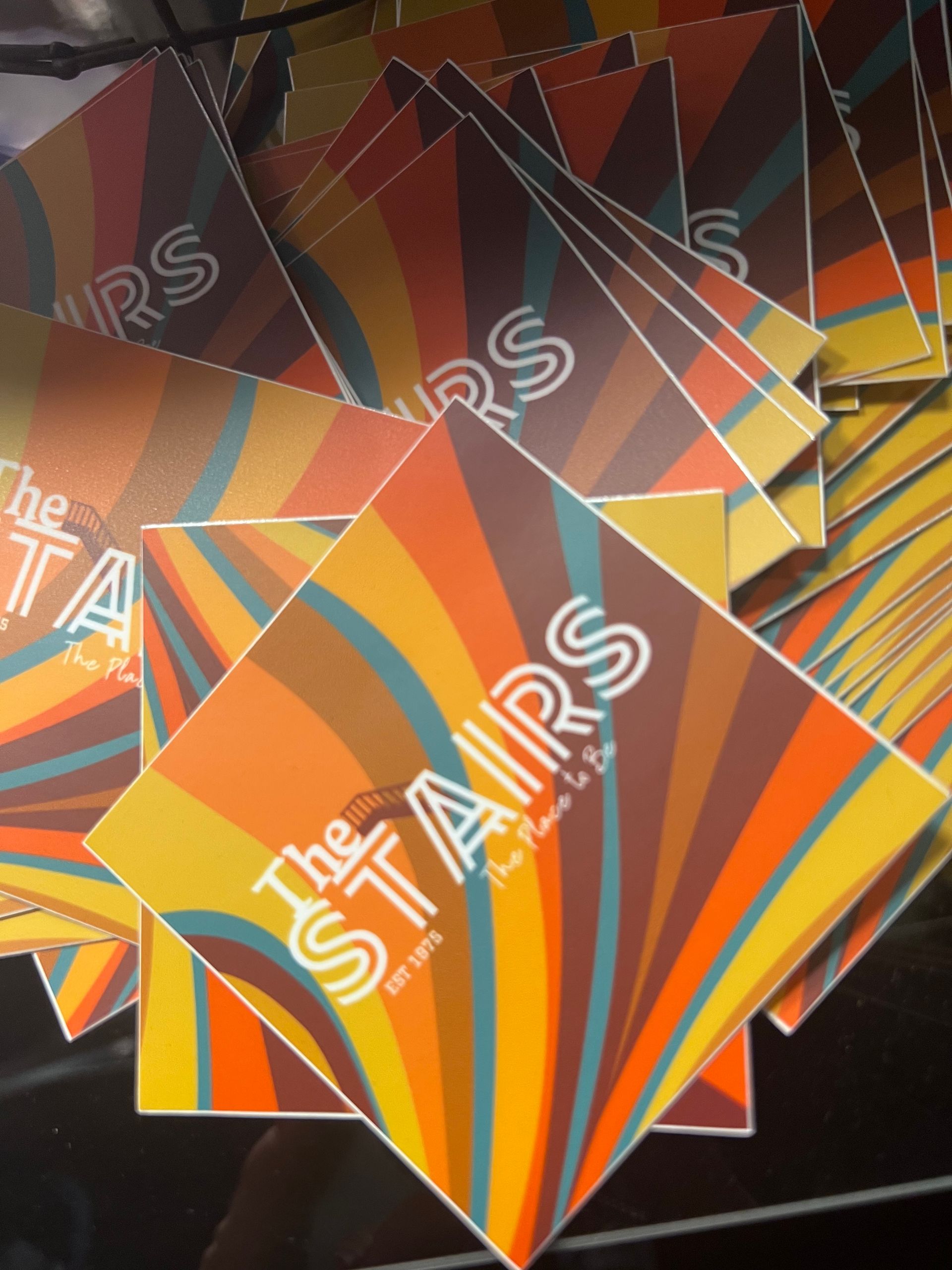 A bunch of stairs stickers are stacked on top of each other