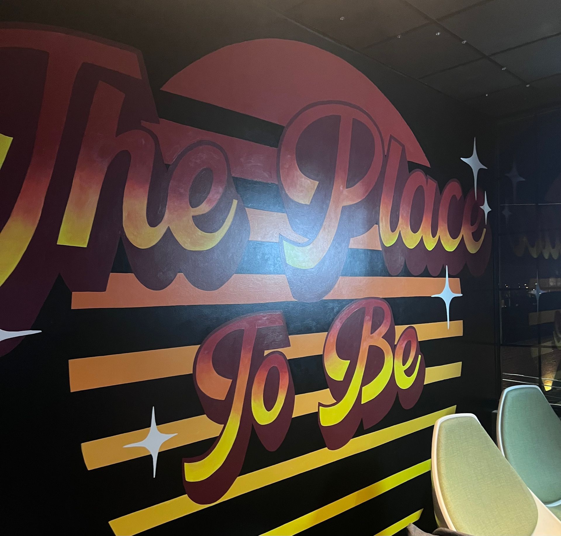 A sign on a wall that says 