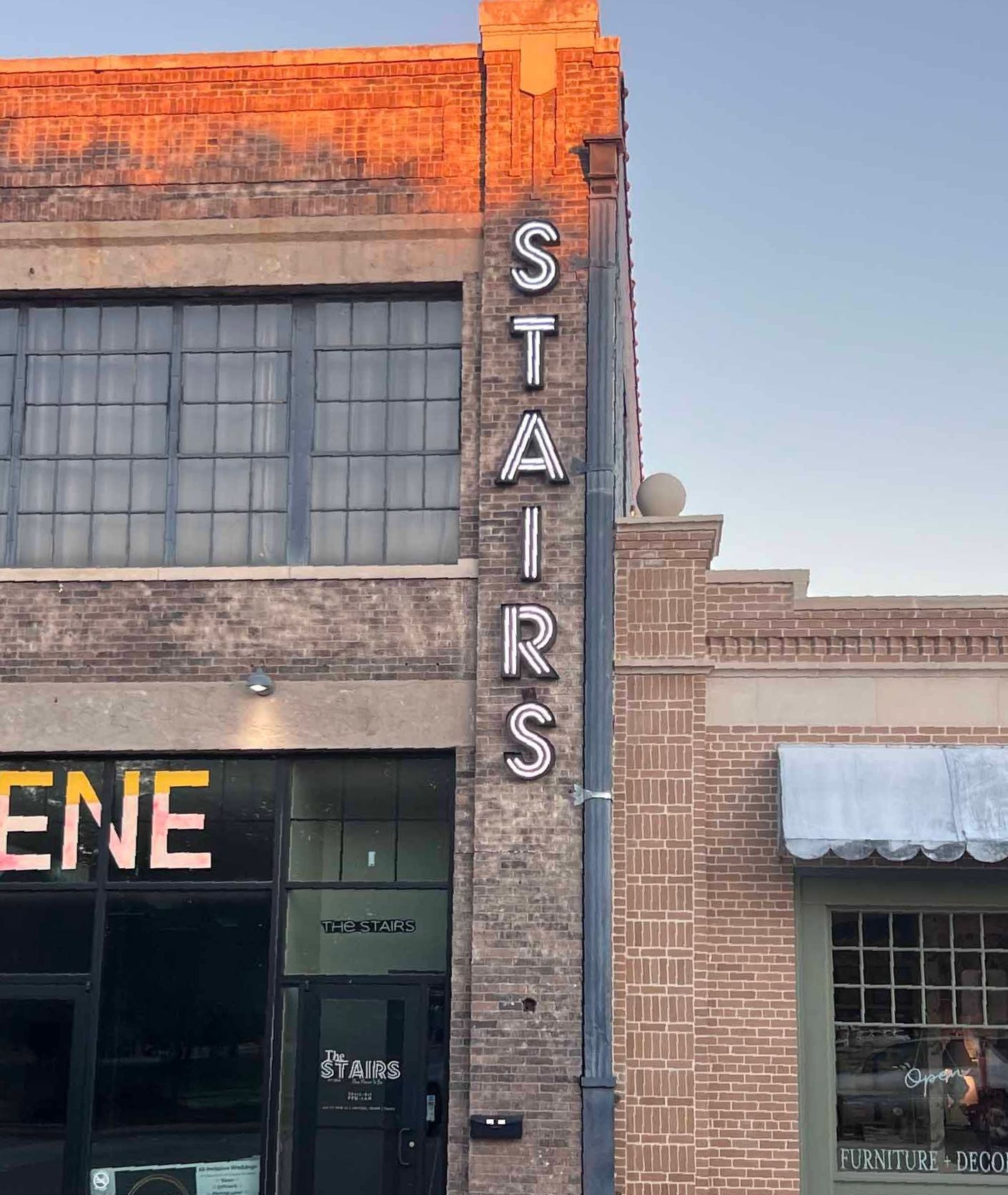 A building with stairs written on the side of it