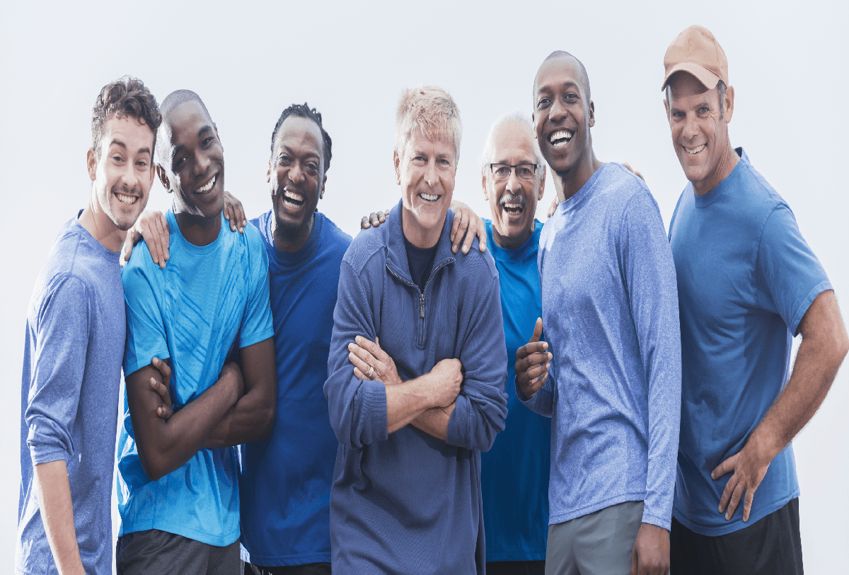 A group of men are posing for a picture together.