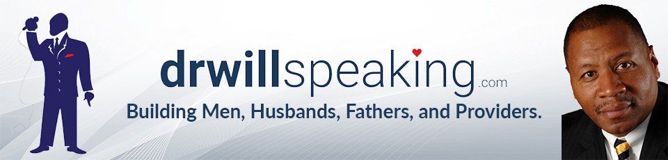 A man in a suit and tie stands in front of a drwillsspeaking.com logo