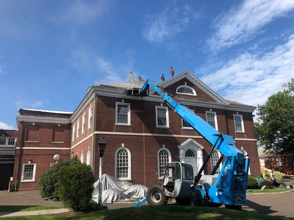 Workers Repair the Roof — Burlington, NJ — AD Roofer Siding & Gutters