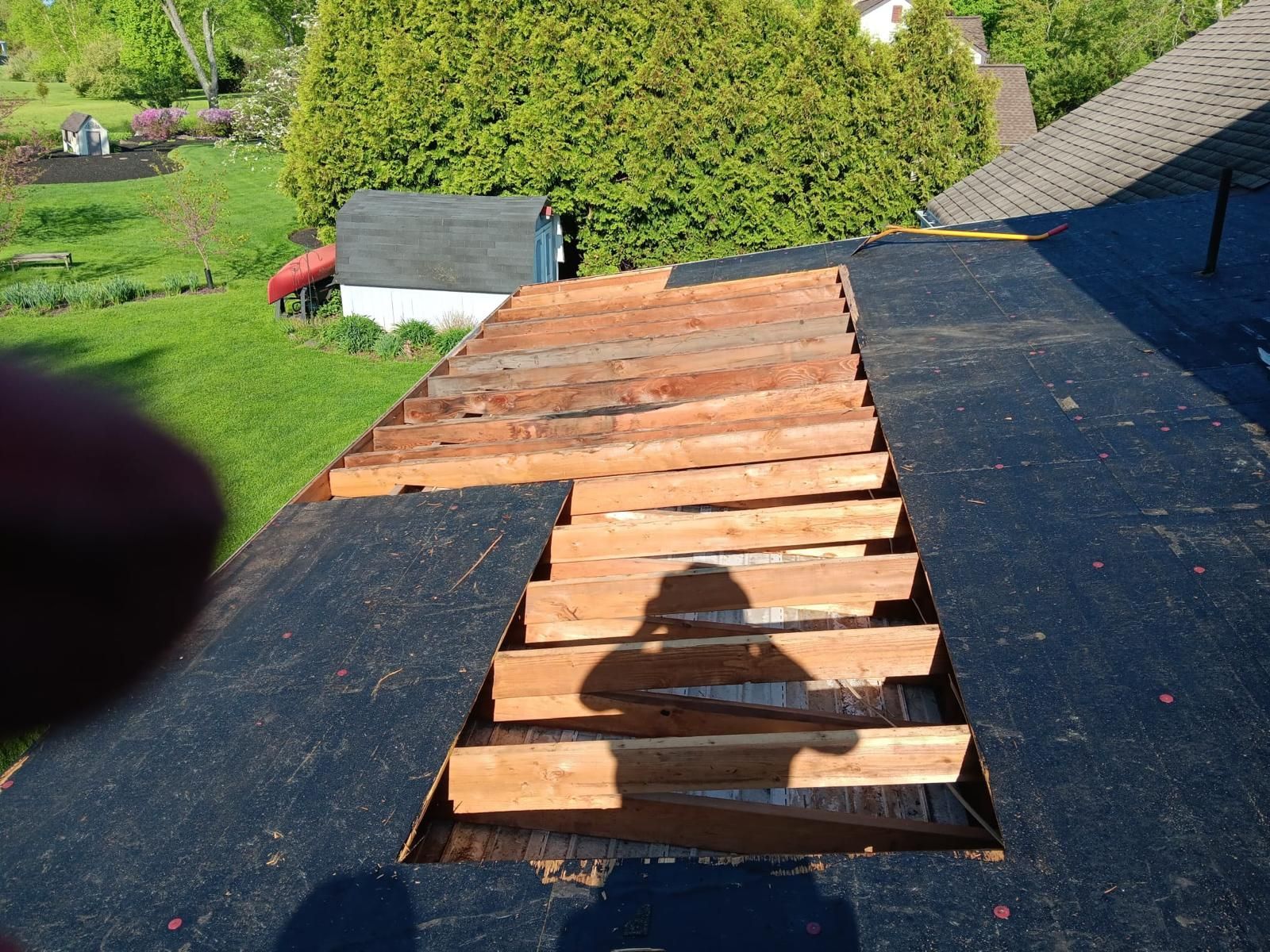 A Roof With a Hole and a Wood in It — Burlington, NJ — AD Roofer Siding & Gutters