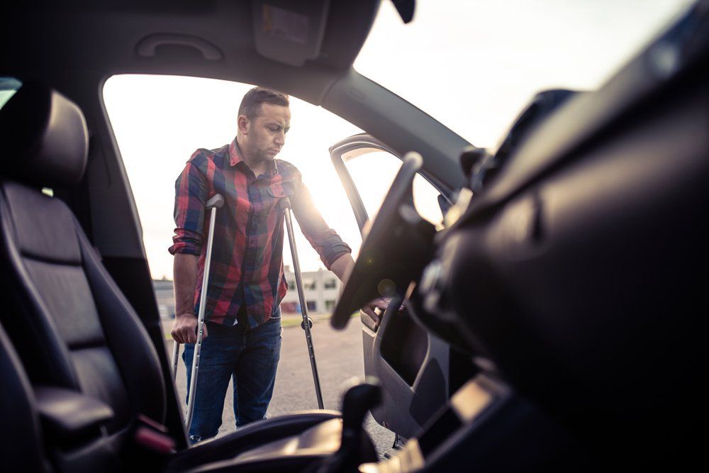 Injured Man With Car — Tavernier, FL — Garrett Chiropractic & Wellness Center