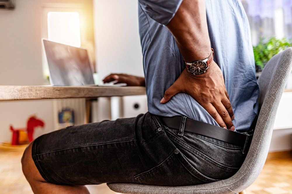 Back Pain While Siting — Tavernier, FL — Garrett Chiropractic & Wellness Center