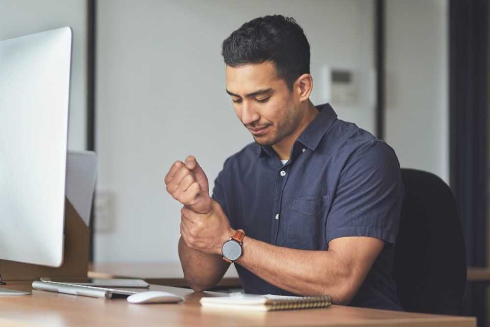 Wrist Pain During Work — Tavernier, FL — Garrett Chiropractic & Wellness Center