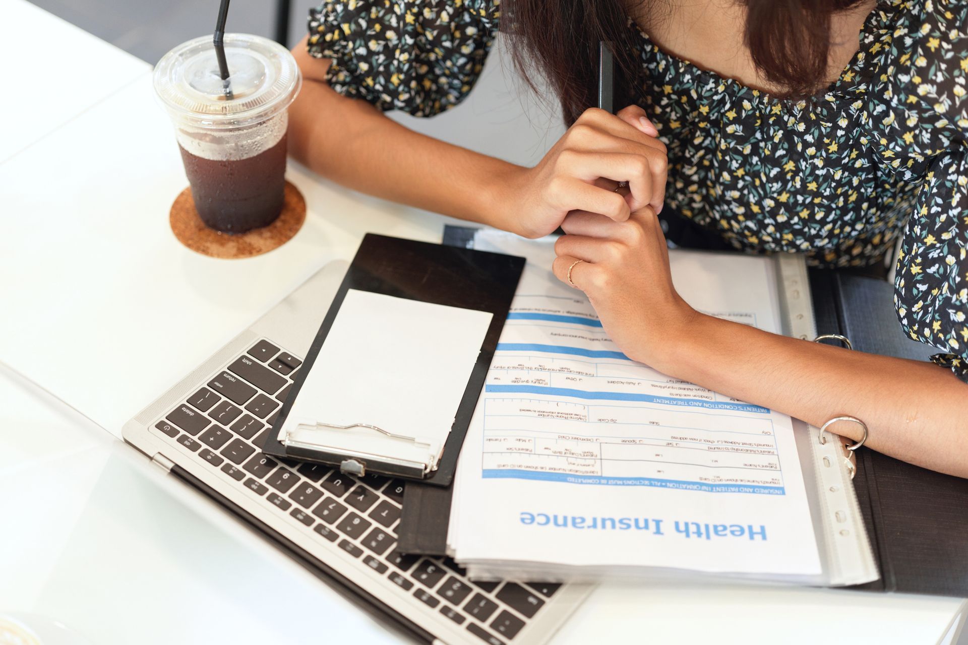 A person writing on a computer