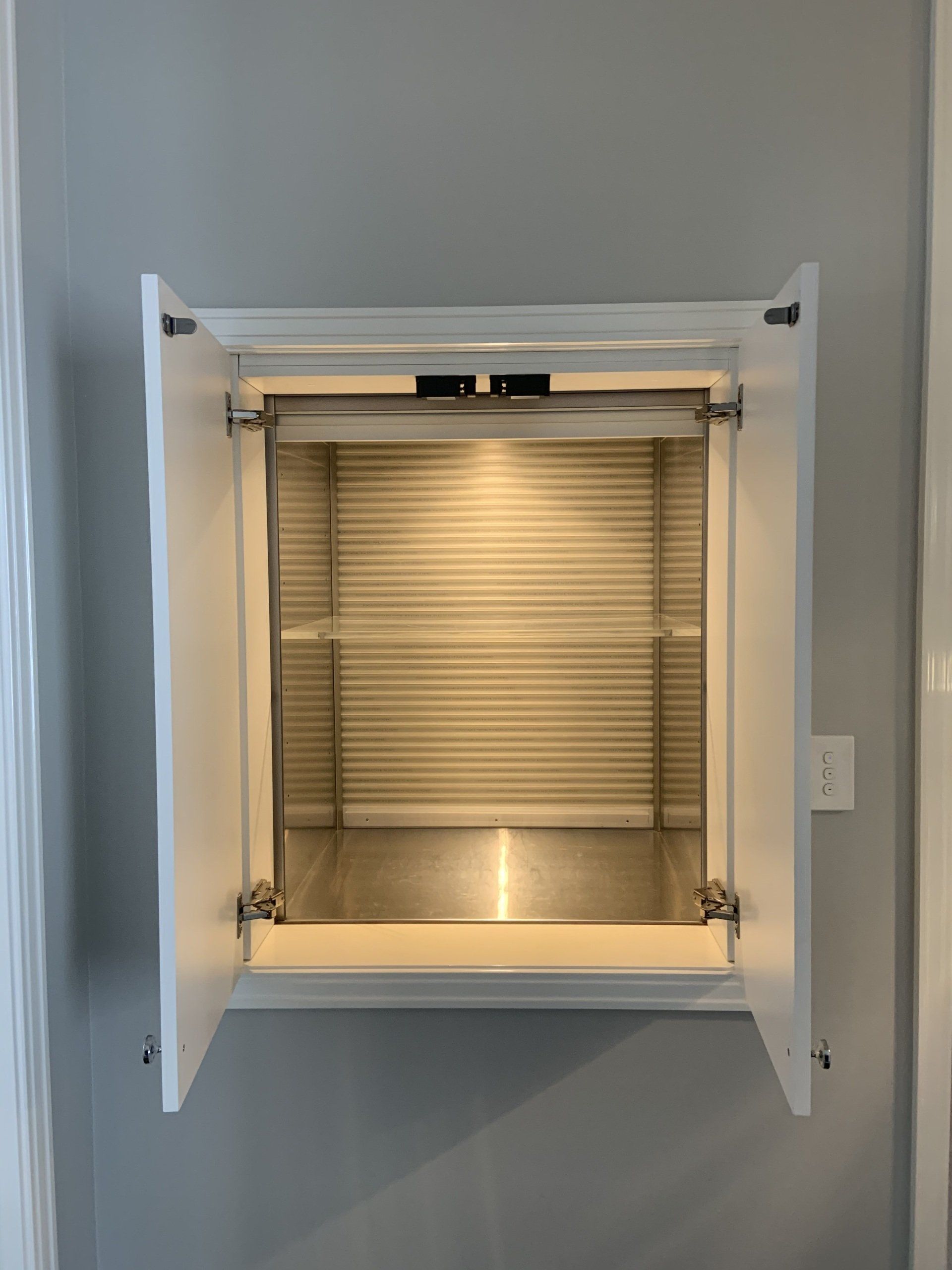 Dumbwaiters With Lights On A Wall — Electrical Projects in Balgownie, NSW