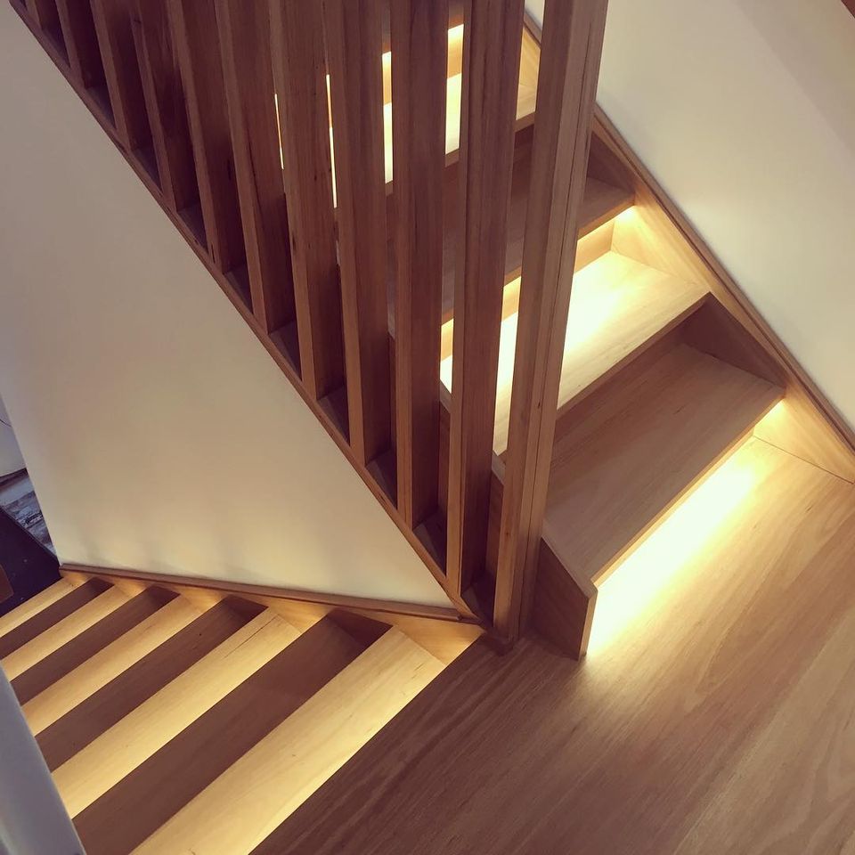 Wooden Stairs With Lights — Electrical Projects in Balgownie, NSW