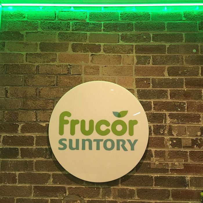Frucor Suntory Signage On A Wall — Woonona Services in Woonona, NSW