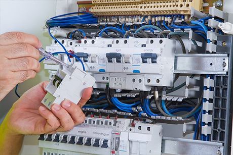 Electrician Fixing Cables — Woonona Services in Woonona, NSW