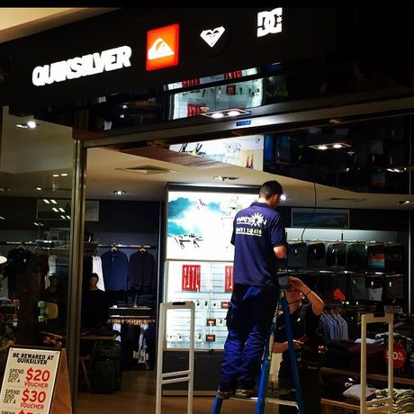 Working On Commercial Signage — Electricians in Sydney, NSW