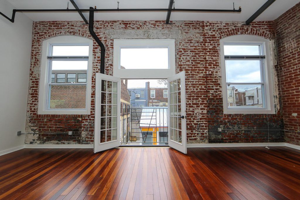 Looking out of open door of one bedroom loft at J Street Lofts in Harrowgate Philadelphia