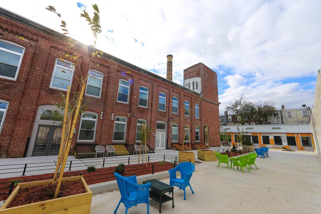 View of outdoor seating and common area at J Street Lofts in Harrowgate Philadelphia
