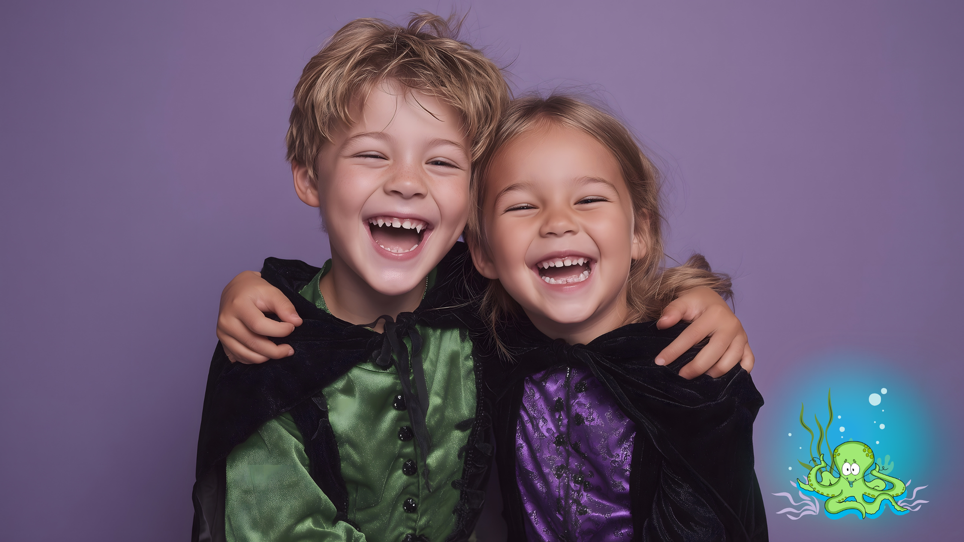 Two laughing children in costumes, arm in arm, against a purple backdrop.