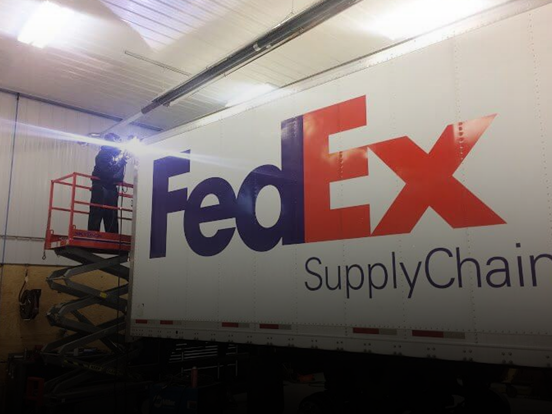 Trailer maintenance for FedEx vehicle inside B&G Truck & Trailer Repair facility