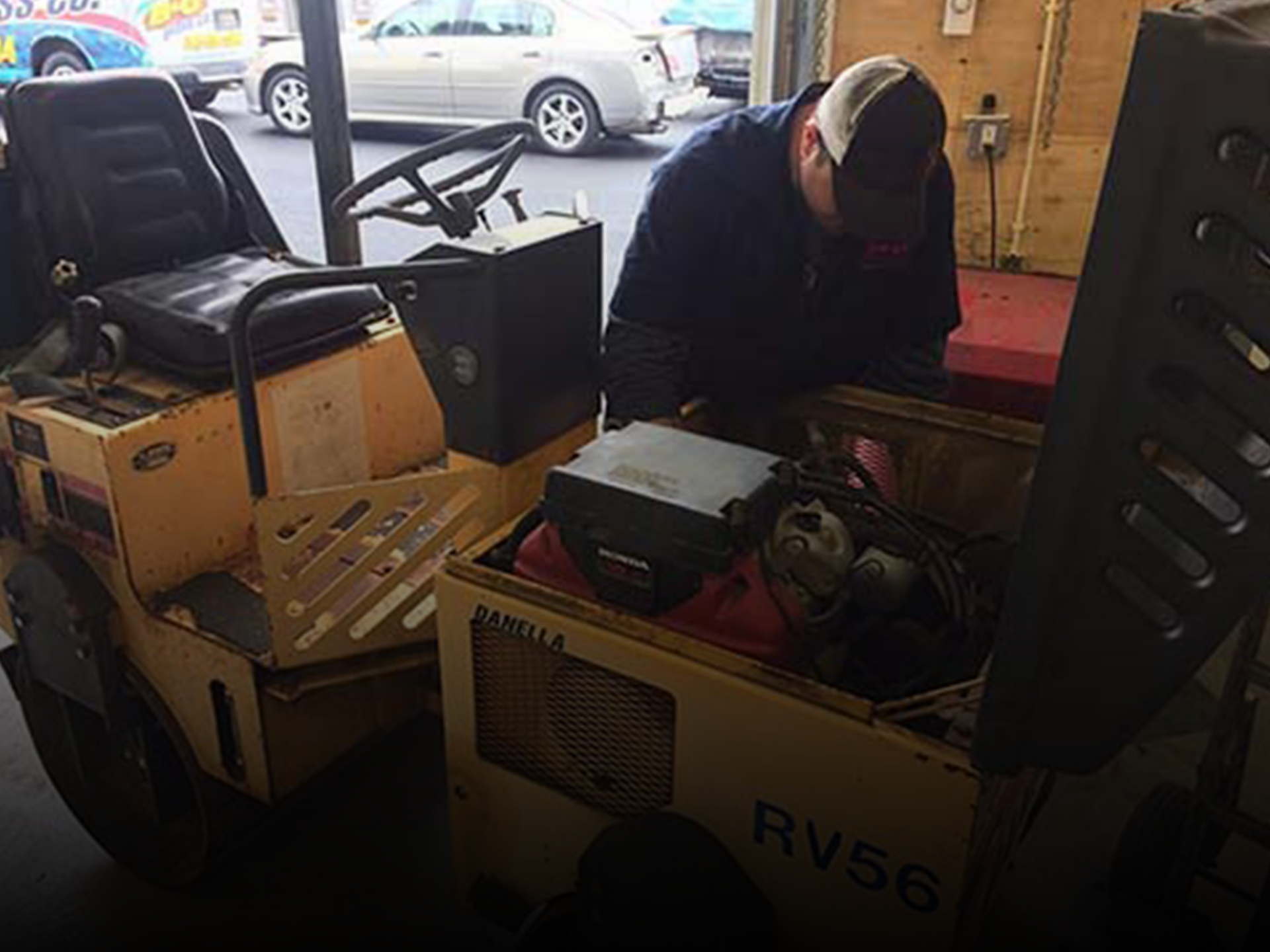 Mechanic working on heavy equipment at B&G Truck & Trailer Repair