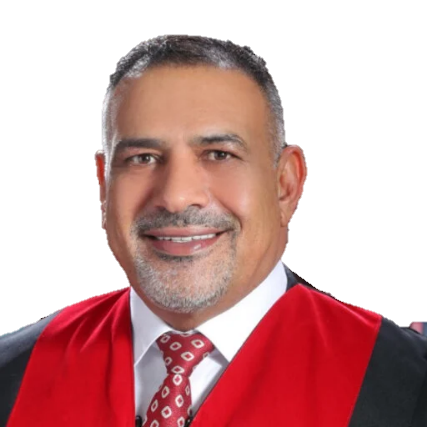 Man in formal attire, smiling, wearing a red and black robe and a patterned tie.