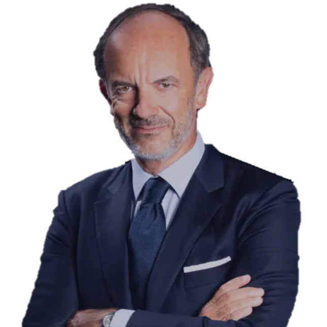 Man in navy suit, arms crossed, smiling.