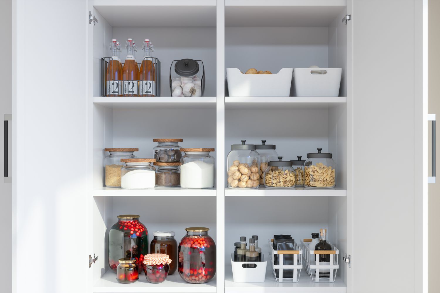White pantry cabinet with organized food jars and containers.