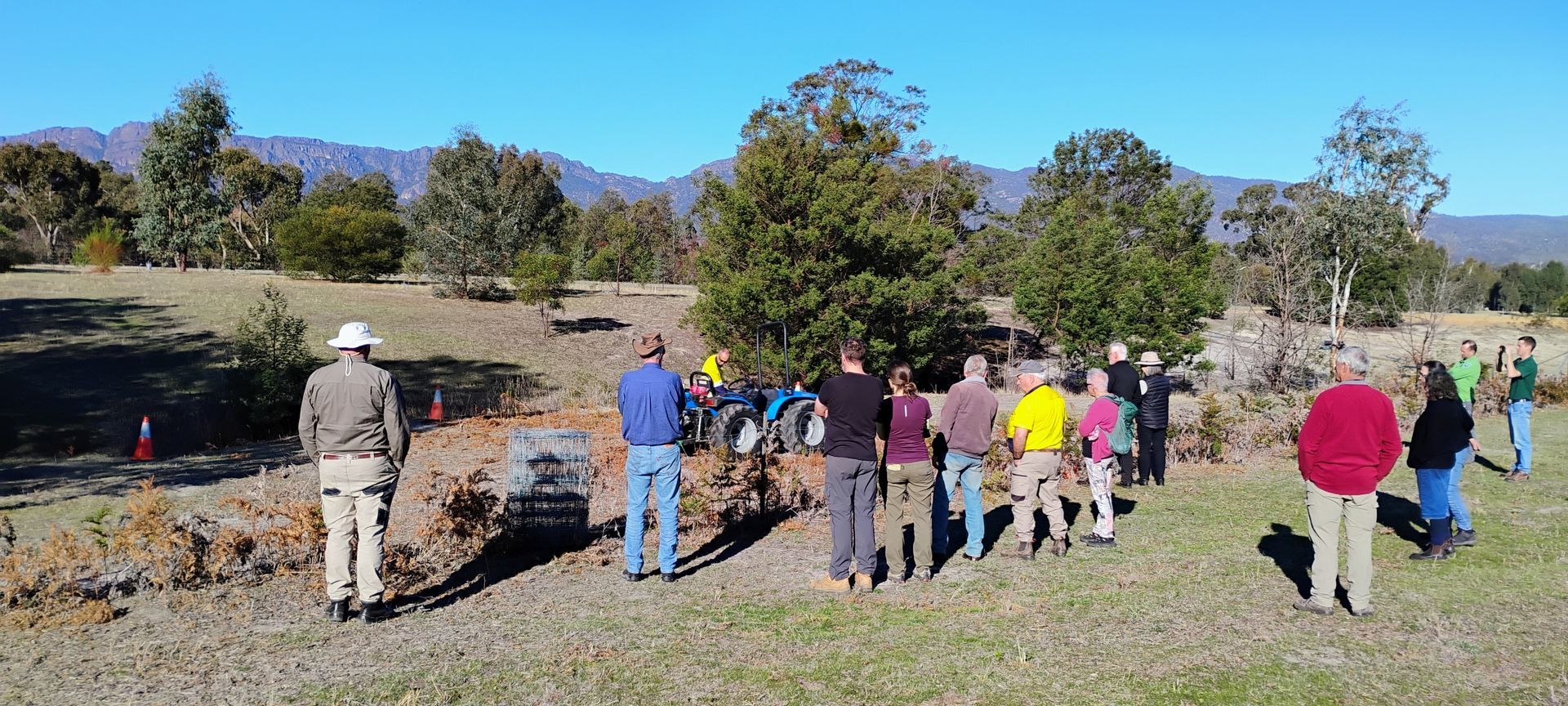 Landholders watching rabbit ripping demo