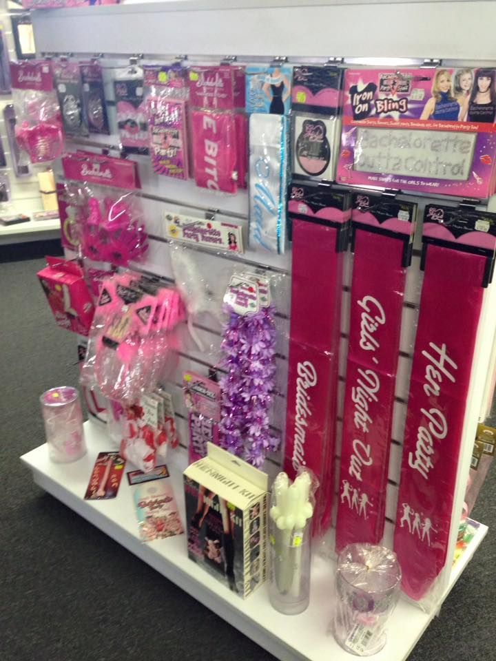 Shelf Display  With Bachelorette Party Favors, Sashes, and Decorations in Pink — A Bit Cheeky The Adult Store In Lismore, NSW
