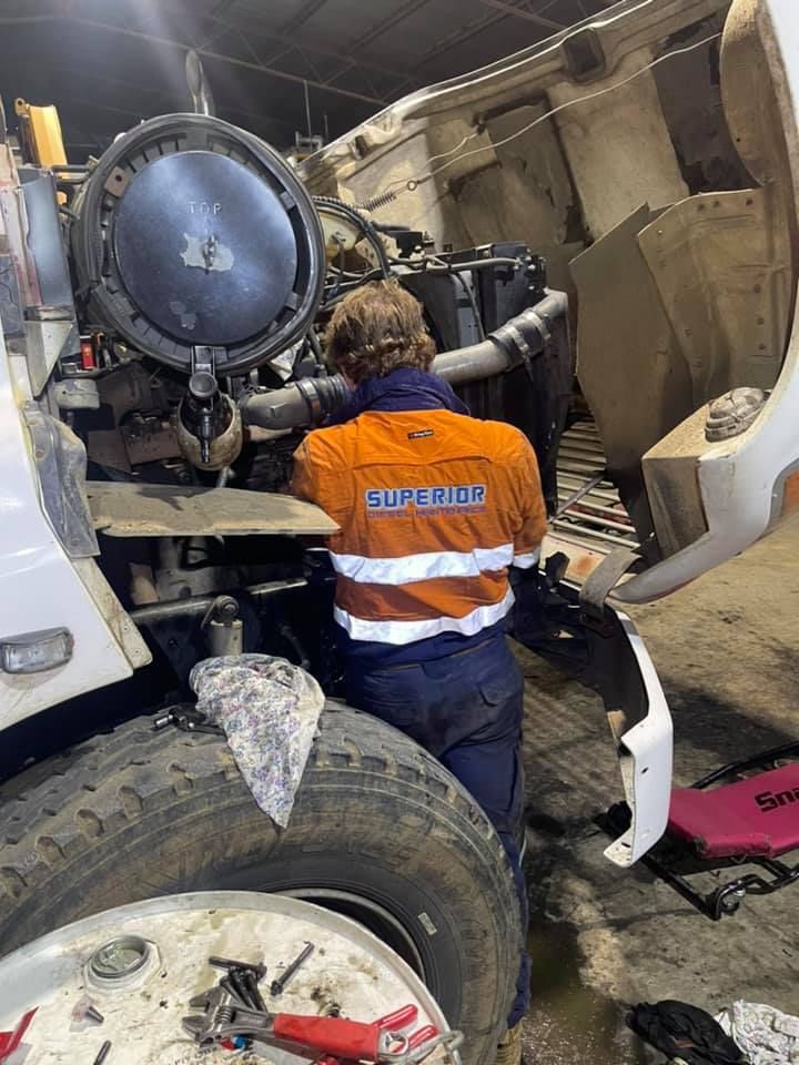 Brand New Engine Filter Being Installed — Superior Diesel Maintenance in Westdale, NSW