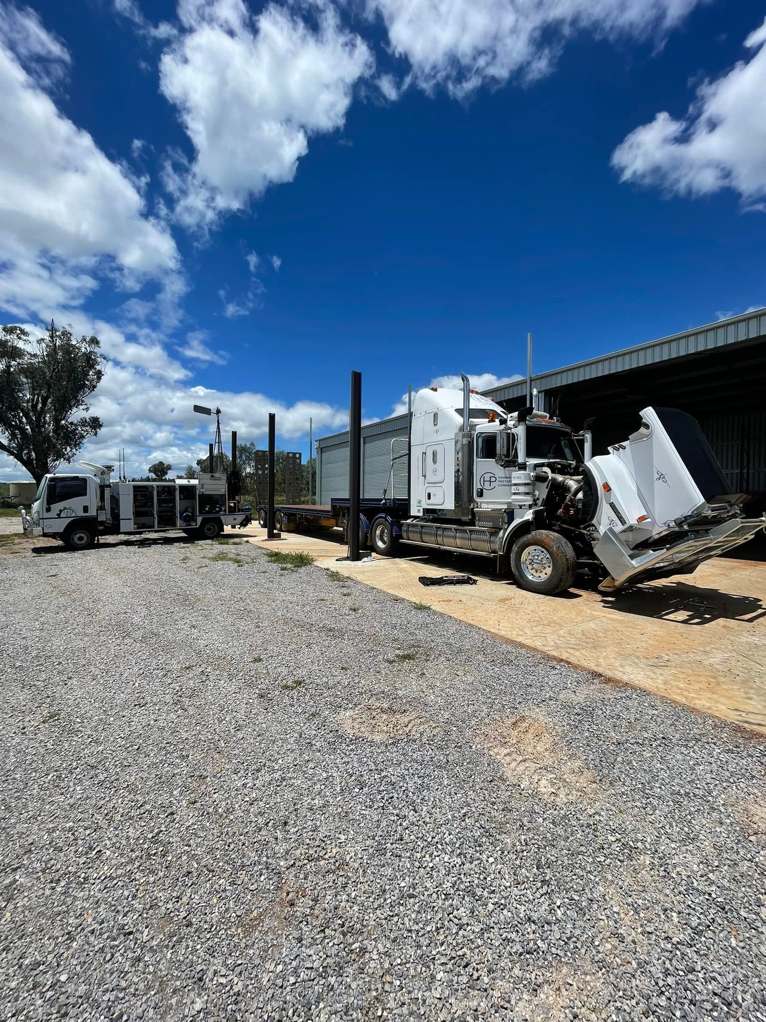 Mechanic Fitting an Engine Gear Using a Hammer — Superior Diesel Maintenance in Westdale, NSW