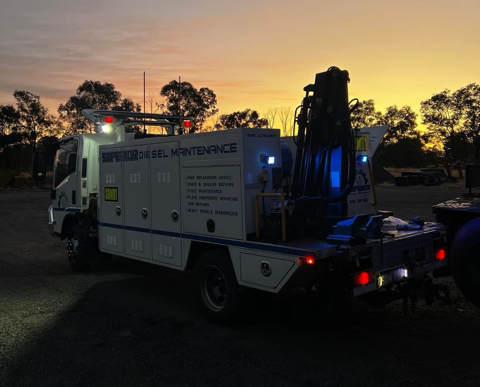 Diesel Mechanic doing Mobile Repair Work After Dark — Superior Diesel Maintenance in Westdale, NSW