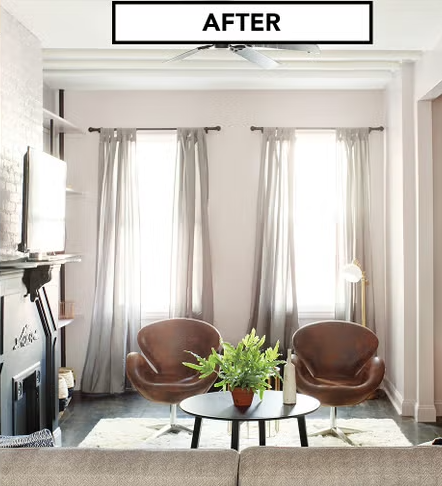 A living room with a sign that says after