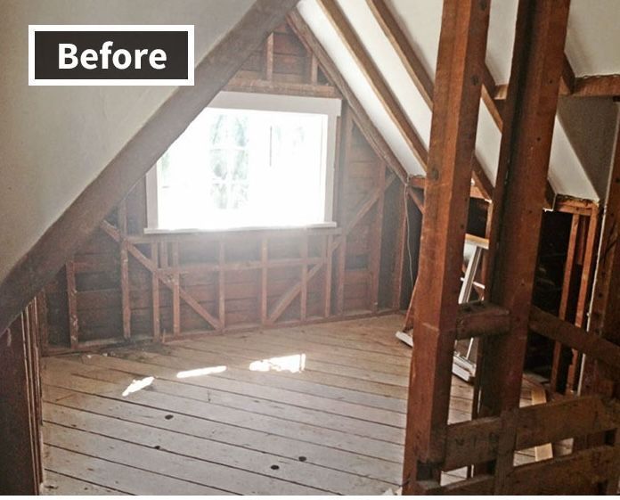 A before picture of an attic with a window