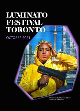 Luminato festival 2021 a woman in a yellow jacket is holding a megaphone