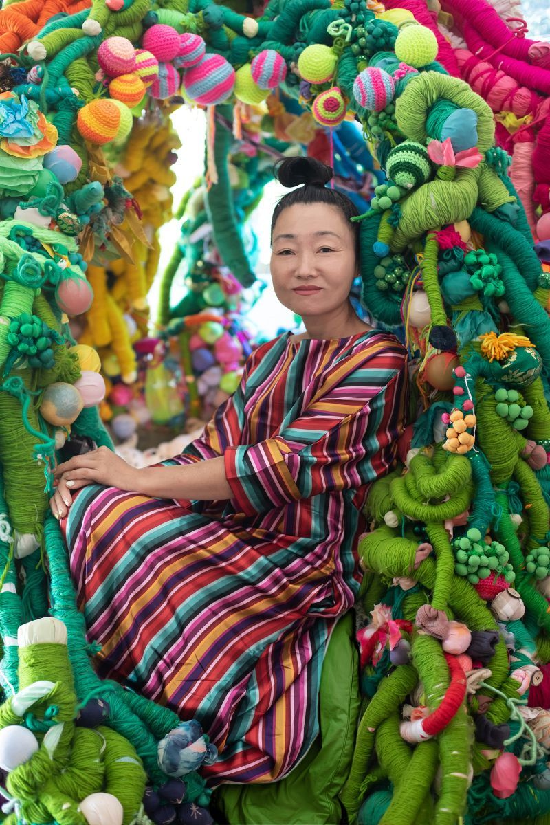 Hiromi Tango surrounded by colours