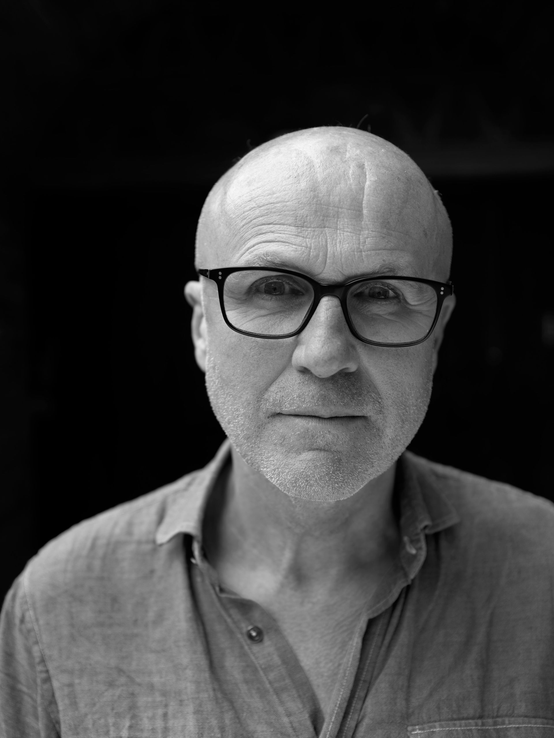 Tim Crouch black and white photo in front of plain background