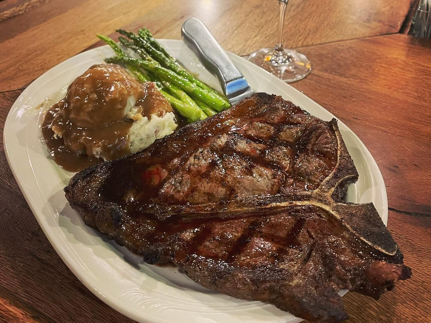 A plate of food with a lot of different types of food on it.