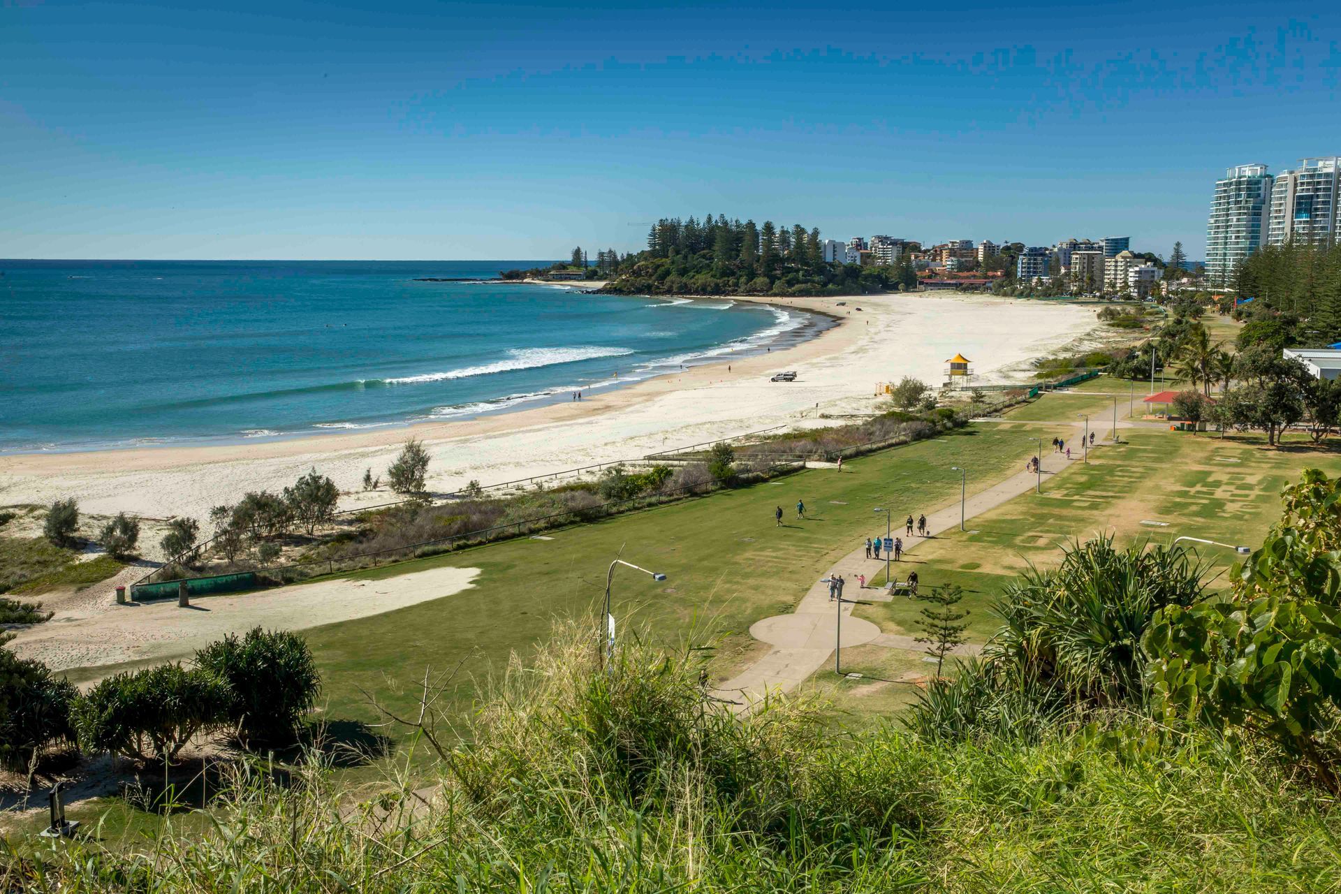 An Aerial View Of A Beach With A City In The Background — Tweed Byron Recycling In Byron Bay, NSW
