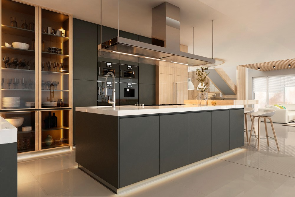 A modern kitchen with a large island in the middle of the room.
