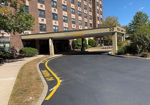 Entrance to apartment building with drive-through, 