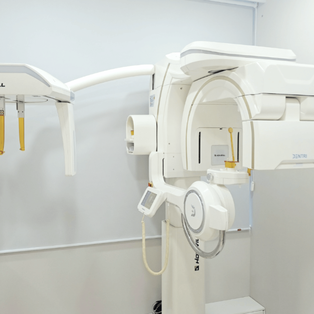 Dental tools in sterilized packages and on a tray, with a paper illustrating the instruments.