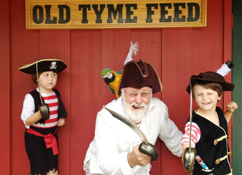 grandkids and grandpa cecil playing pirates at the garden supply store