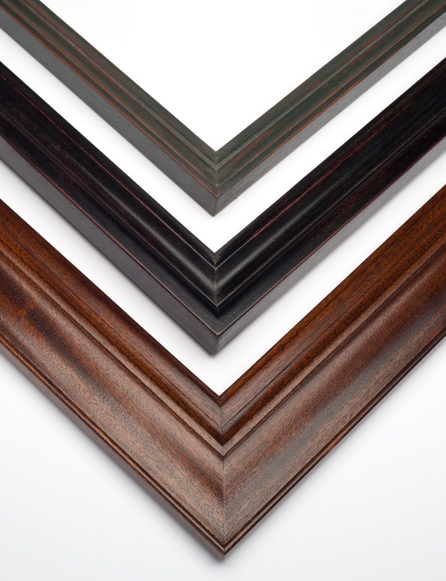 Three nested wooden picture frames in descending shades of brown, displayed against a white background.