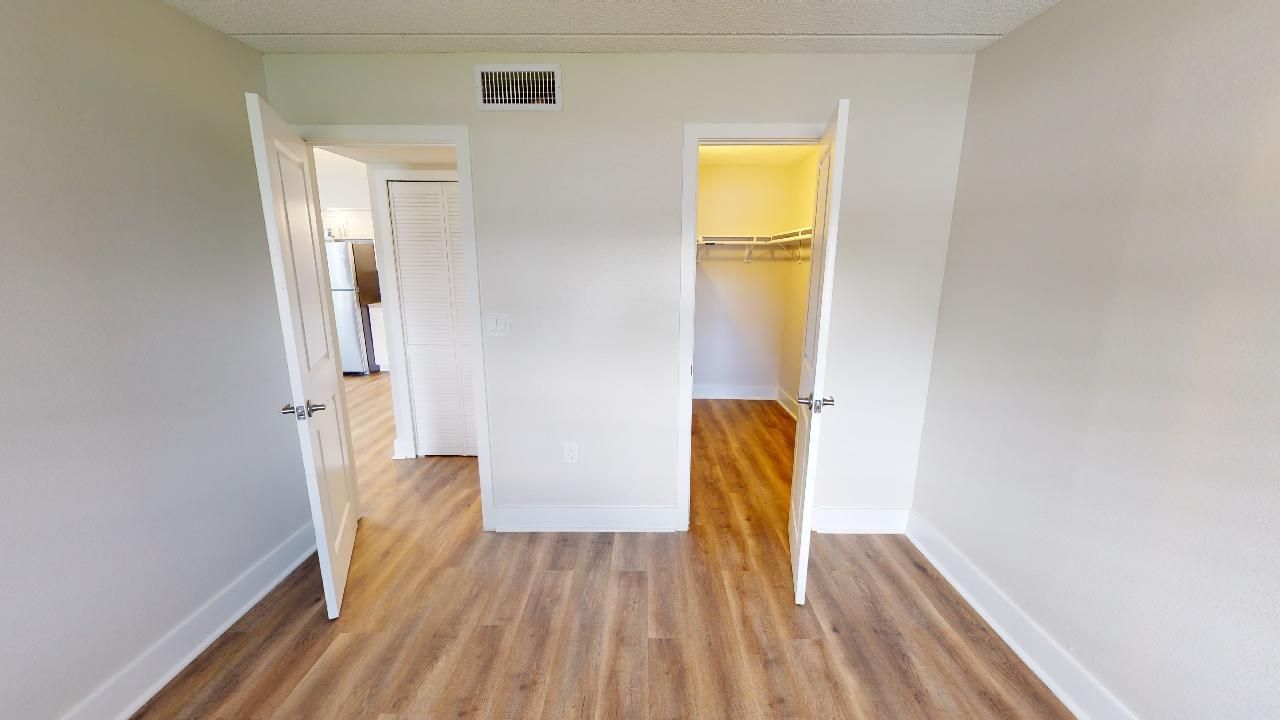 Bedroom and closet at Park on Central in Kissimmee, FL.