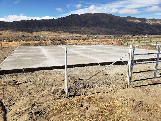 A Large Concrete Slab is Sitting in the Middle of a Wide Dirt Field – Reno, NV – Concreteworks LLC