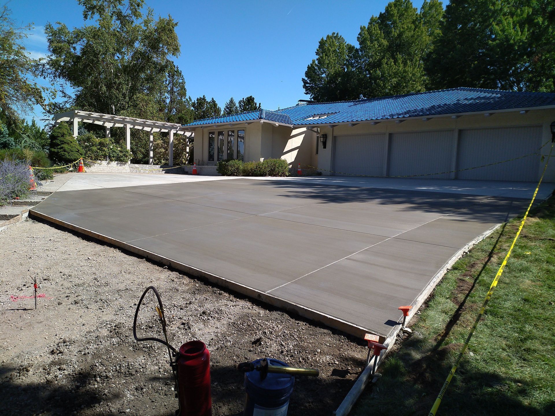 A Concrete Driveway is Built in Front of a House – Reno, NV – Concreteworks LLC