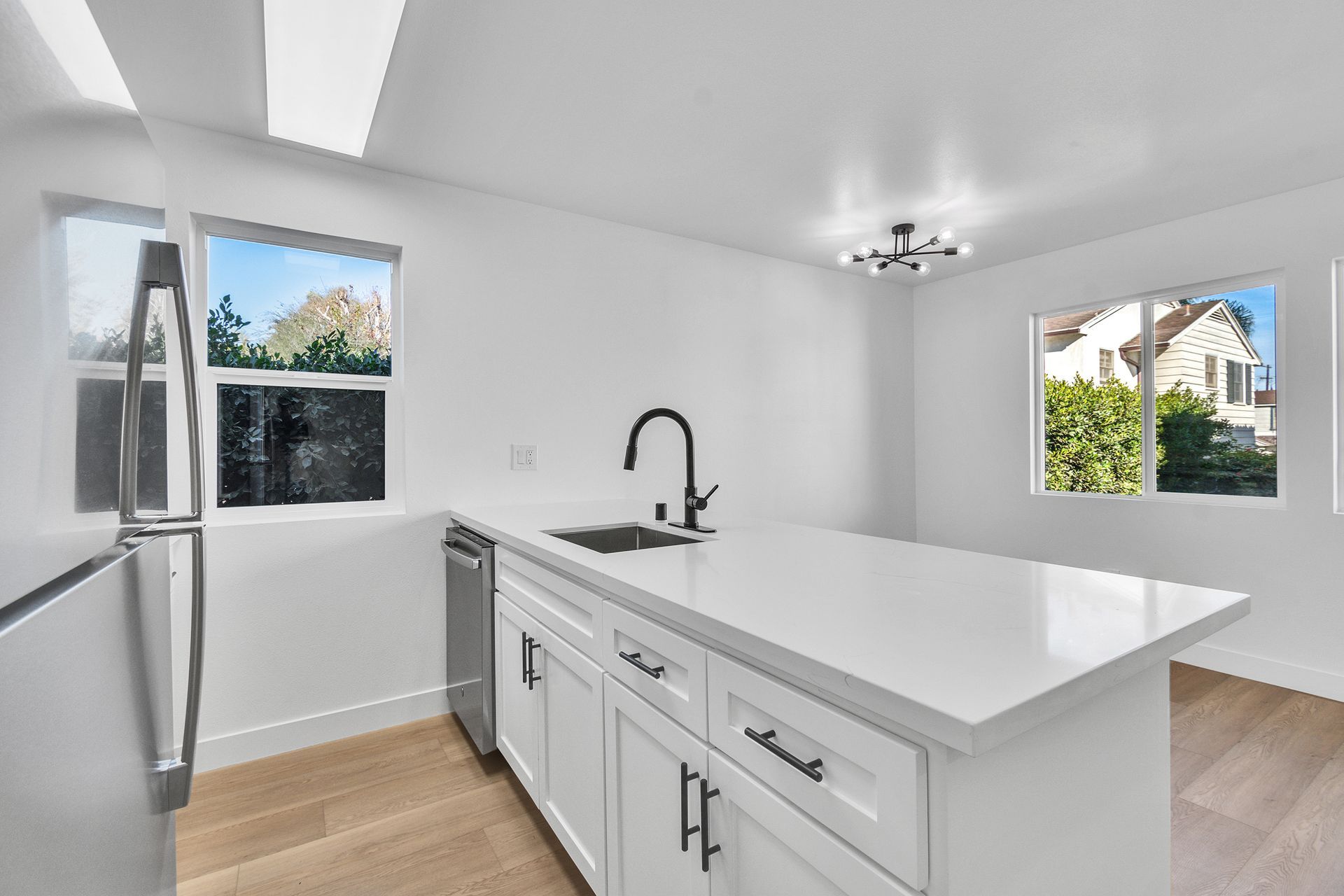 There is a large island in the middle of the kitchen.