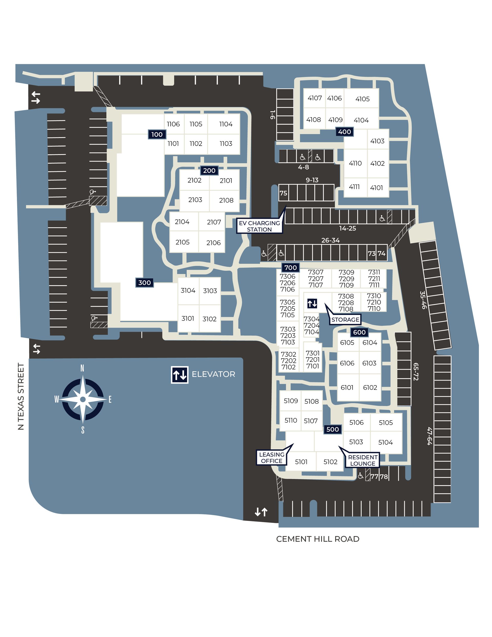 Map with buildings, parking areas, and a compass.