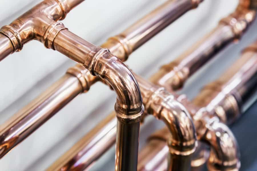 A Close Up of Copper Pipes Connected to Each Other — All Plumb & Gas in North Boambee Valley, NSW
