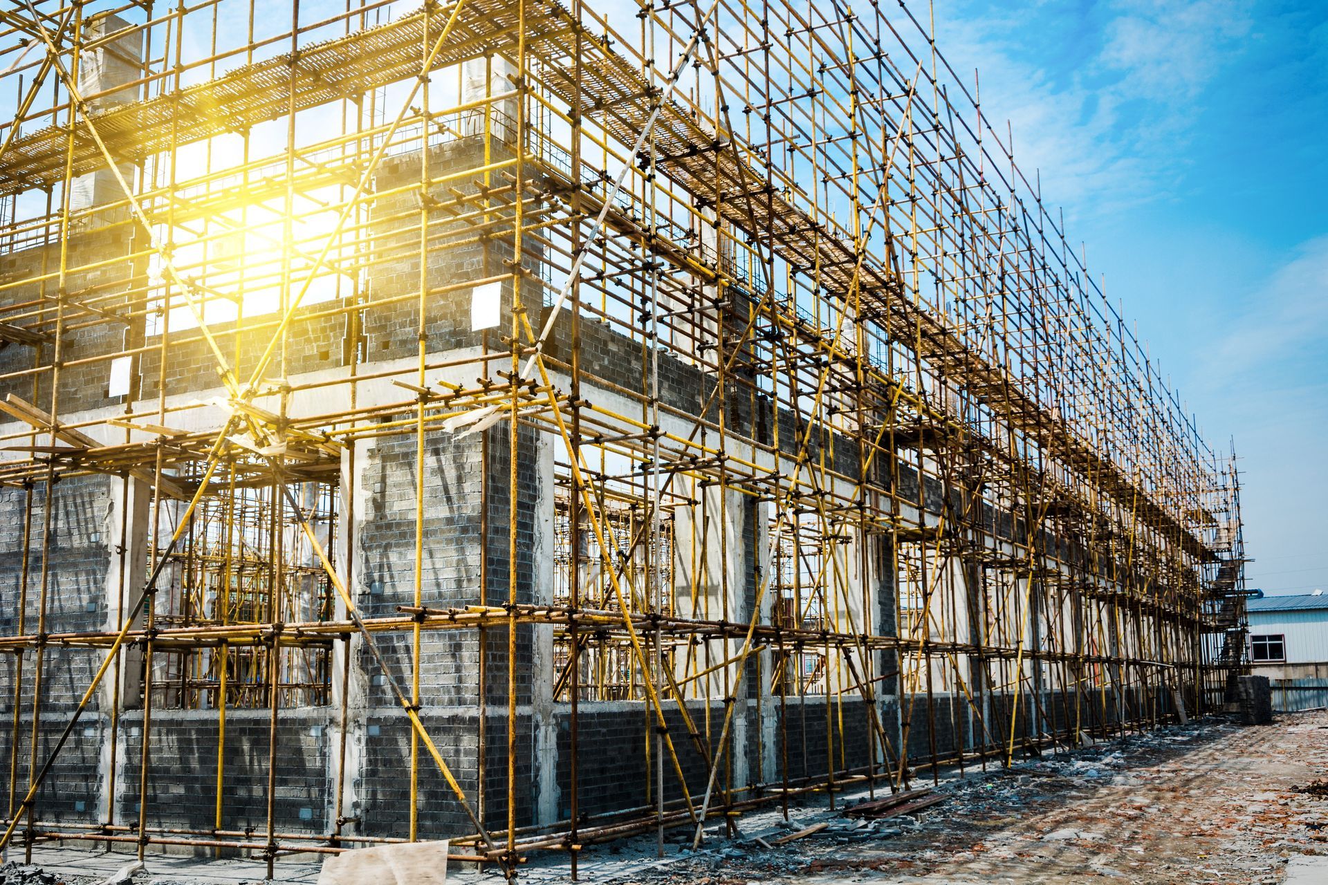 A large building is being built with scaffolding around it.